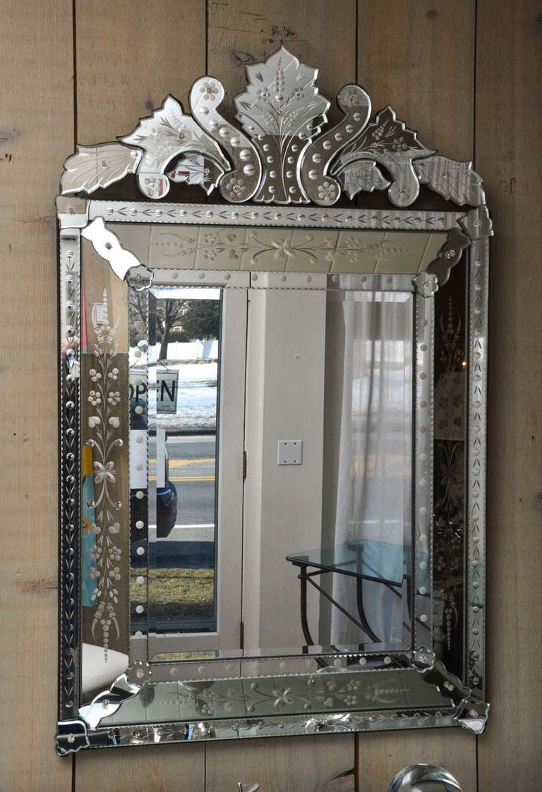 Attractive etched and beveled Venetian mirror