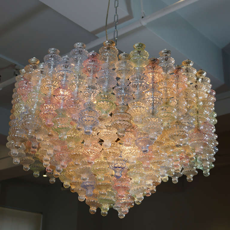 Chandelier by Seguso Vetri D'Arte
Multi colored glass in shades of pale blue, pink, green, lavender, clear, and gold. Documented.
Takes 18 euro bulbs.
19