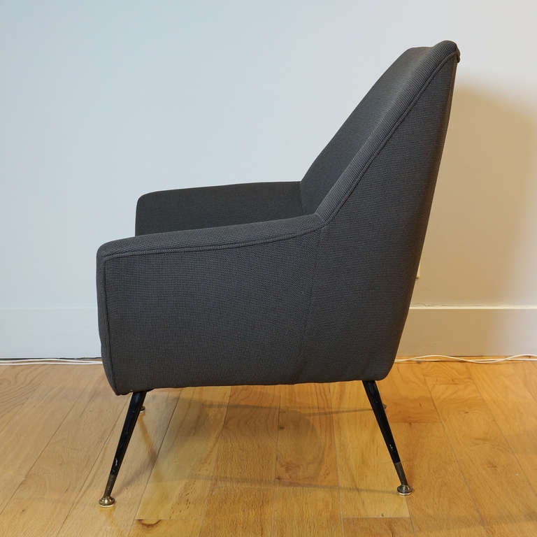 Pair of armchairs. Italian, c. 1950. Grey upholstery, metal legs.
34