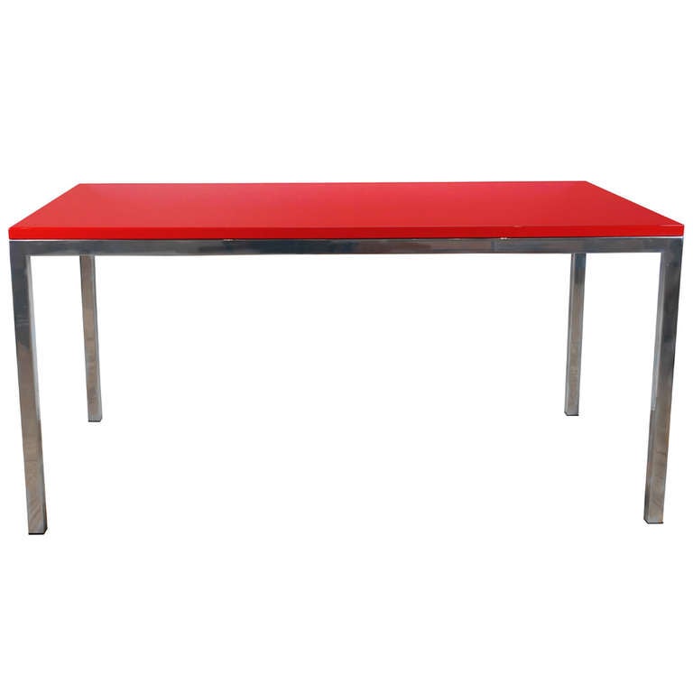 Classic Parsons style desk. High gloss lacquer finish top available by your order in any color. Polished stainless steel base with seamless construction. Highest quality workmanship. Made to order.

Measures: 29.25