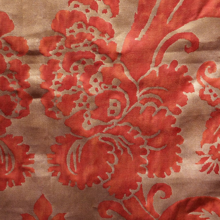 Vintage Fortuny fabric panel in the Glicine pattern, with a rolling R border.
Italy, circa 1960. Hand-printed cotton in red with a gold overlay.
Approximately: 55″ x 53″.
Reference number: GDF-049.