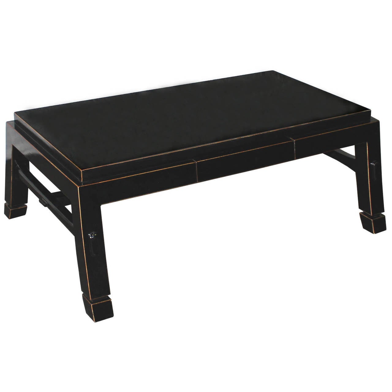 Black lacquer rectangular coffee table with splay legs, hand rubbed edges with one drawer is a custom designed by furniture designer, Eric Brand.