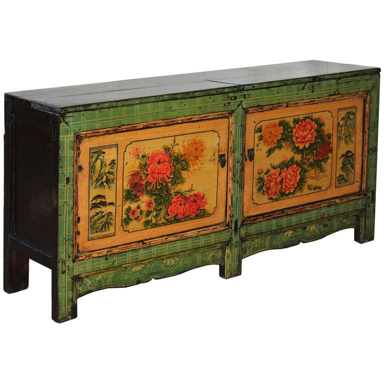 Unusual hand-painted buffet with chrysanthemums and peonies representing prosperity and abundance. Original green plaid design with elegant scalloped bottom skirt makes this one of a kind buffet a focal point in any room. New interior shelves and