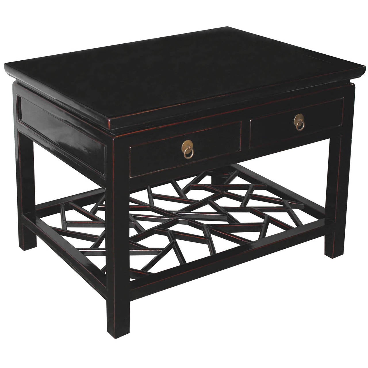 Elegant four-drawer coffee table with exposed rubbed edges, straight legs, and cracked ice bottom shelf. Display in front of couch and place a short stack of books below.