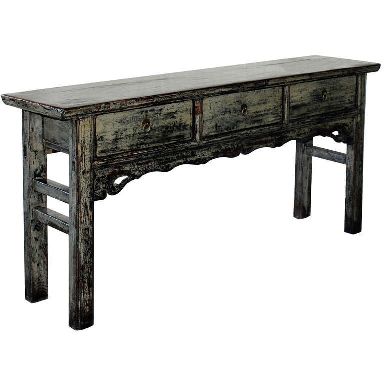 Three-drawer gray lacquer console table with scalloped skirt and side bar support . Can be used behind a sofa or in an entryway. New hardware. Shanxi, China circa 1880s.