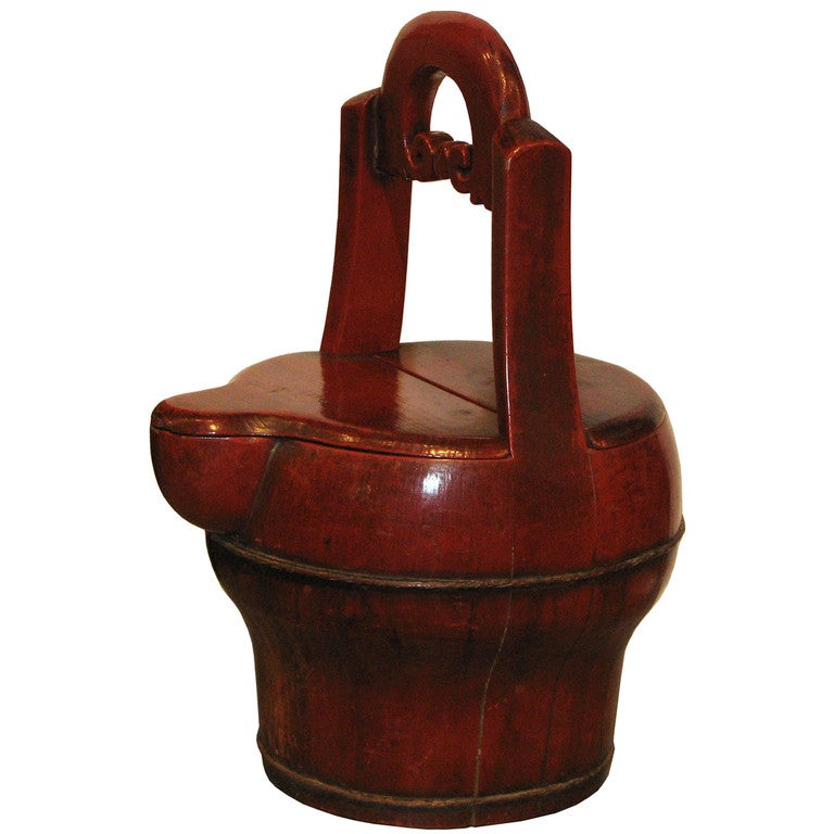 Antique red lacquer water bucket with beautiful patina. An elegant container to hold an orchid or to place on a bookshelf.
