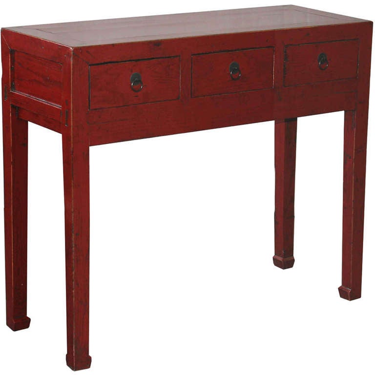 Elegant three-drawer red lacquer console table with horse hoof feet. Use in an entryway or behind a sofa. China circa 1890s.  Regularly $ 2250, on Sale for $ 1499.