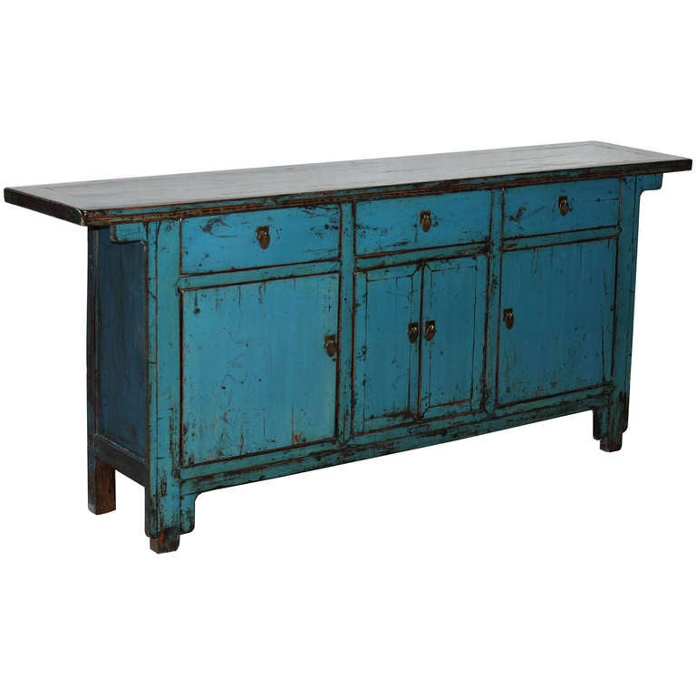 Three-drawer blue buffet with overlapping top, simple side spandrels and straight bottom skirt. With new interior shelving and hardware. Shandong, China circa 1890s.