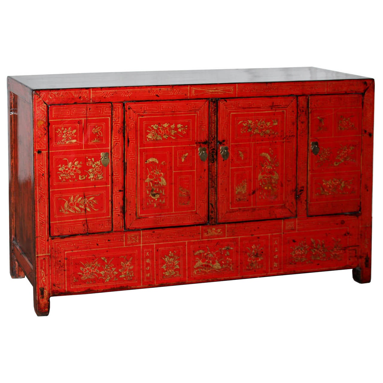 Four-door red lacquer wedding buffet with hand-painted gold leaf peonies, symbolizing prosperity and red representing happiness. New interior shelf and hardware. Middle bar removes for easy interior access, Dongbei, China, circa 1880s.