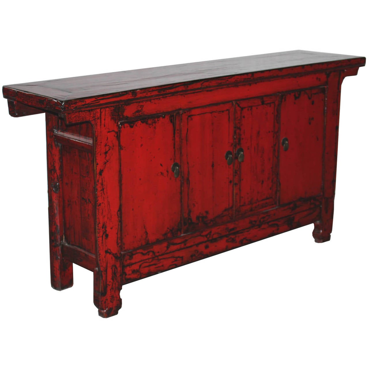 Four-door red lacquer sideboard with simple side spandrels and carved feet. New interior shelf and hardware. Place under a flat screen tv as a media cabinet or use as a server in the dining room. Gansu, China circa 1880s.