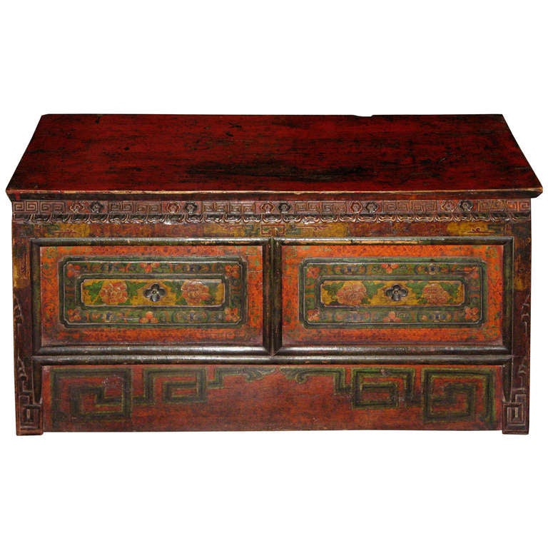 Beautifully hand-painted and carved Tibetan prayer chest. Used by Buddhist monks in a temple for praying and storing prayer books. 