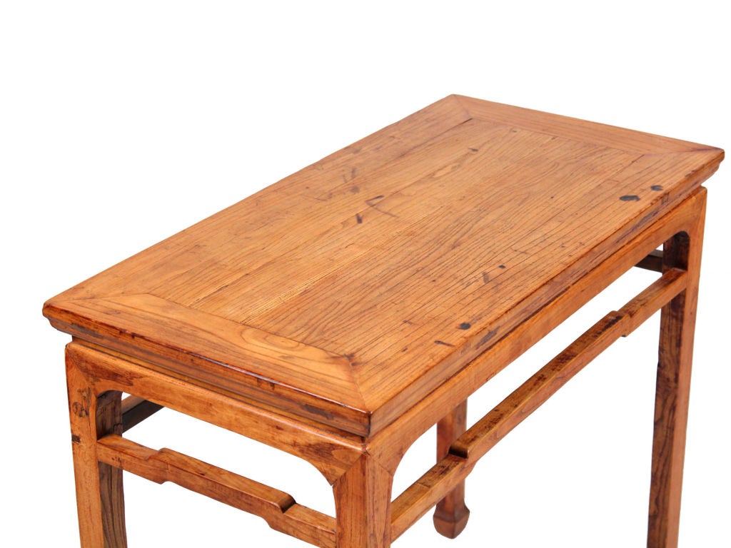 Vintage elm wood altar table with horse hoof legs can be used behind a small sofa or in an entry way.