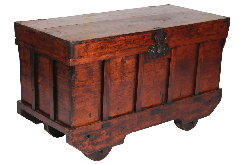 Antique Japanese nagamochi with wooden wheels, edo period c1825.<br />
Originally used as a storage trunk in Japan.