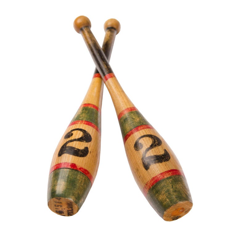Pair of vintage juggling pins.  Smaller pin measures 2.5 dia x 15h