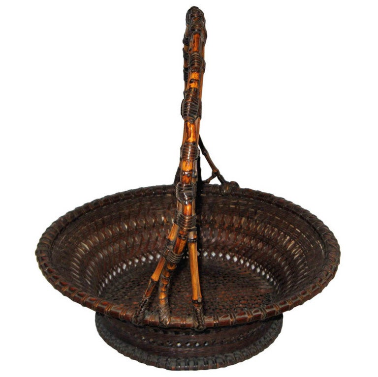 Japanese antique bamboo ikebana basket with handle from Kyoto, Japan, Meiji period, circa 1885.