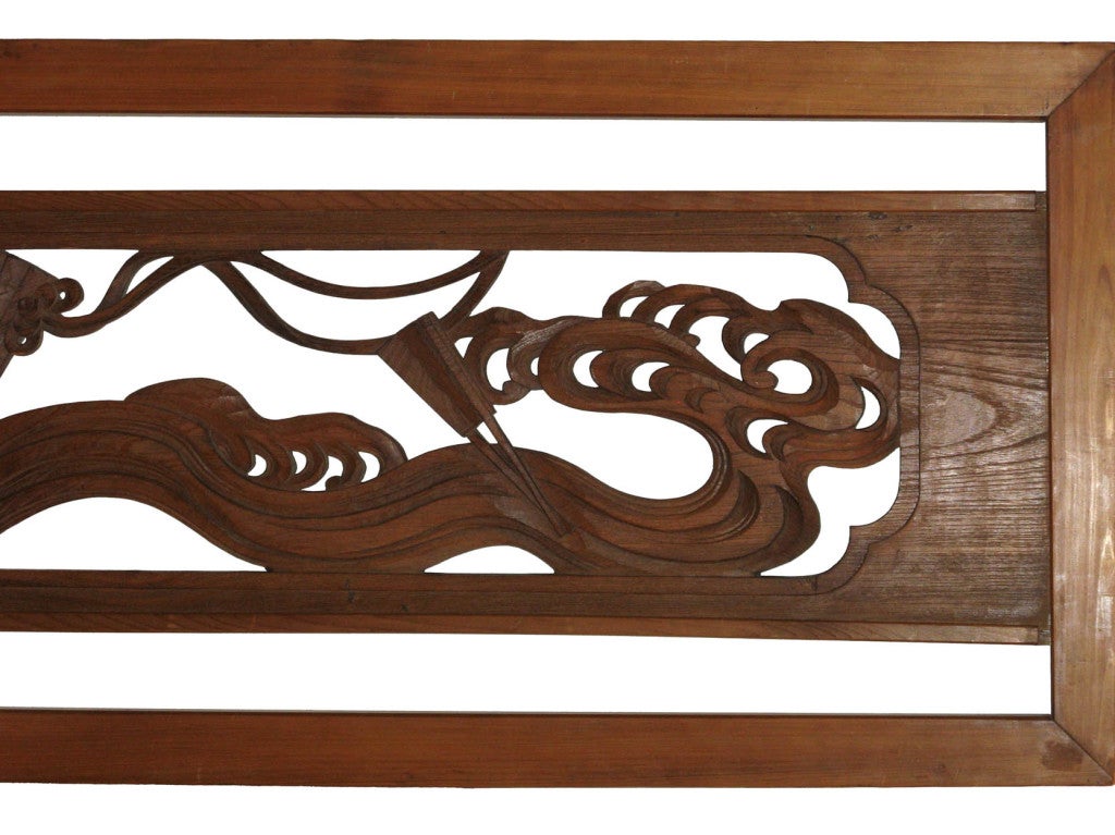 Vintage Taisho period Japanese ranma or transom was originally used as decoration above doorways. Made of keyaki (elm) wood with folding fan design floating on waves of water. Beautiful as wall decor, or could be used as a headboard.