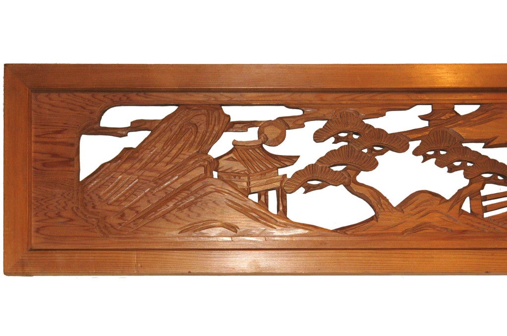 Vintage Taisho period Japanese ranma or transom originally used as decoration above doorways. This hand-carved cedar and cypress piece depicts a serene country scene with islands, mountains, a bridge and pine trees. Transom may hang as an art piece