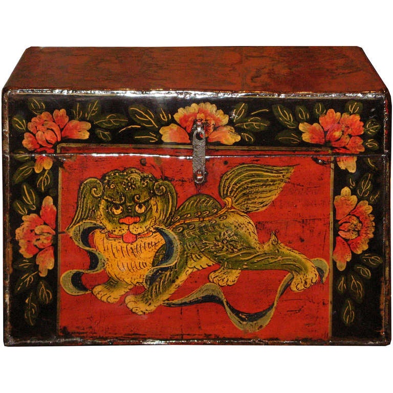 Hand-painted mythical lion graces the front of this antique Mongolian wedding box. Lions symbolize protection and peonies flowers represent prosperity for the newlyweds. Red is used for weddings to bless the couple with happiness.