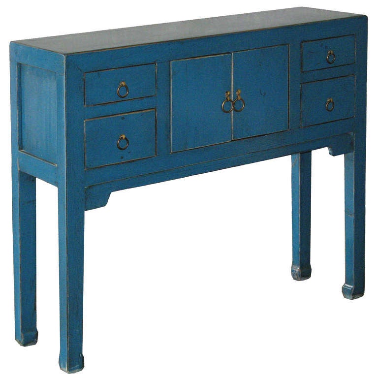 Contemporary small four-drawer blue console table. Regularly $ 1450 on sale for $ 925