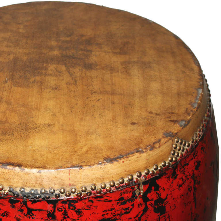 Large red ceremonial drum originally used in village celebrations in southern China. Use as an accent table with or without a glass top.