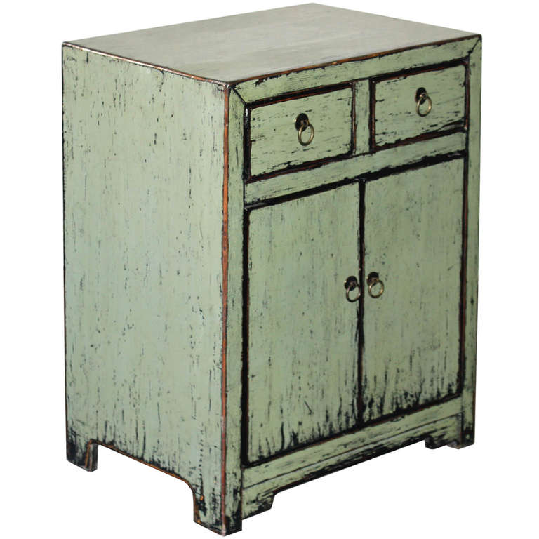 Contemporary hand-lacquered sage side chest would look great next to bed or chair.