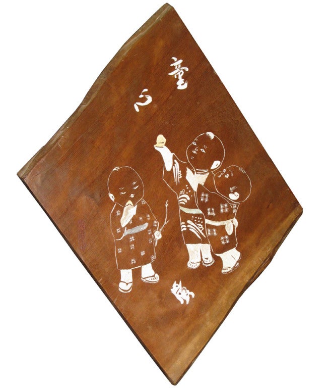 Vintage Showa period Japanese keyaki wood panel. Engraved and painted depiction of three young boys in traditional kimonos were a gift to Mr. Suzuki. The kanji lettering translates to compassionate heart. Wood panels such as these are often given as
