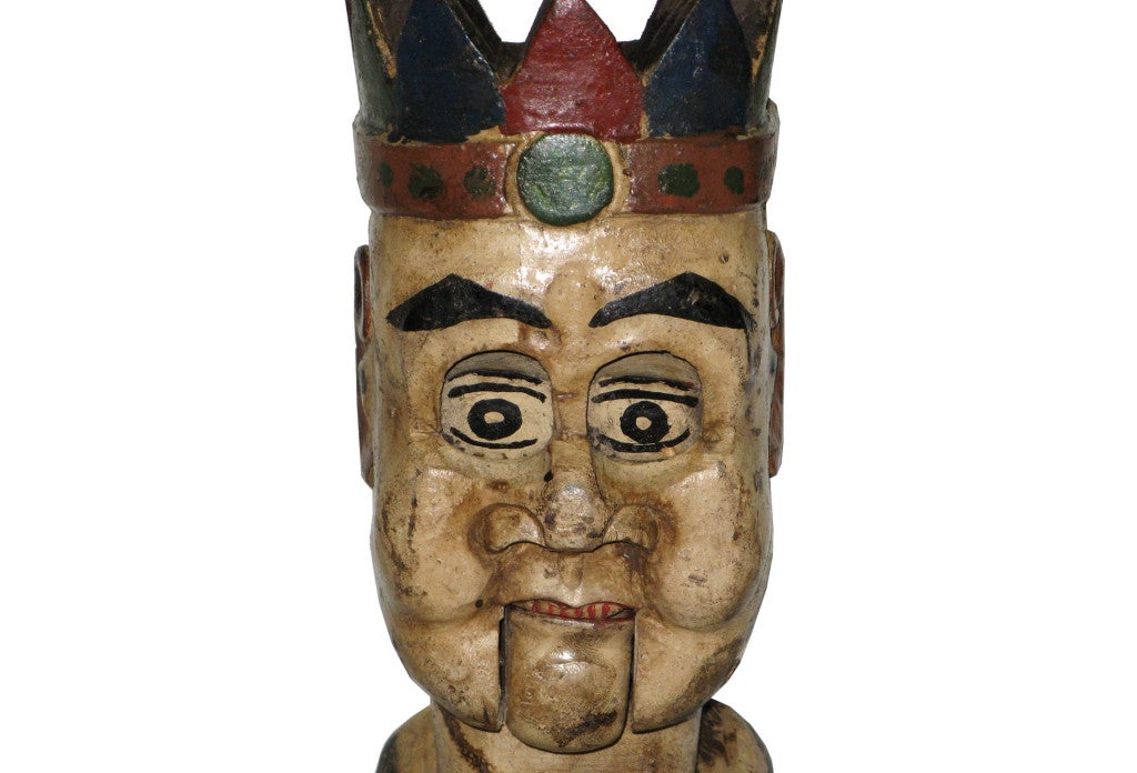 Vintage hand carved wooden folk figure head used by a puppeteer to entertain children. Circa 1950s. Mounted on a black wood stand.
