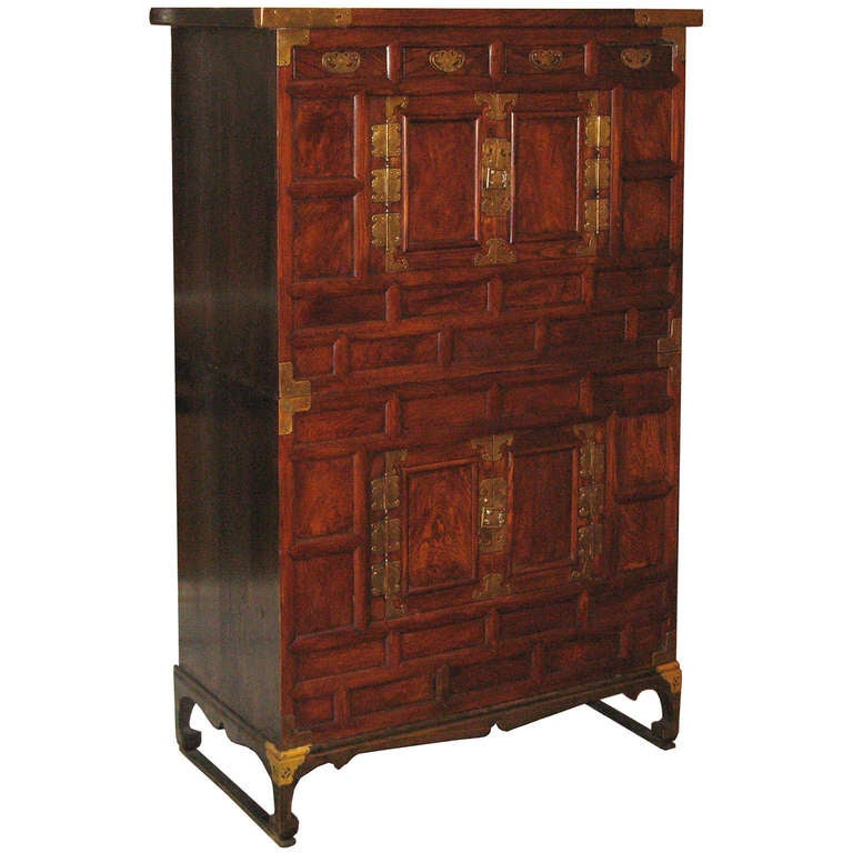 Chosun dynasty two section Korean chest on chest on stand was typically used to store clothing and accessories in a bedroom. Brass hardware with bat symbolizes good fortune and luck. Typically given to a bride and groom from their parents as a