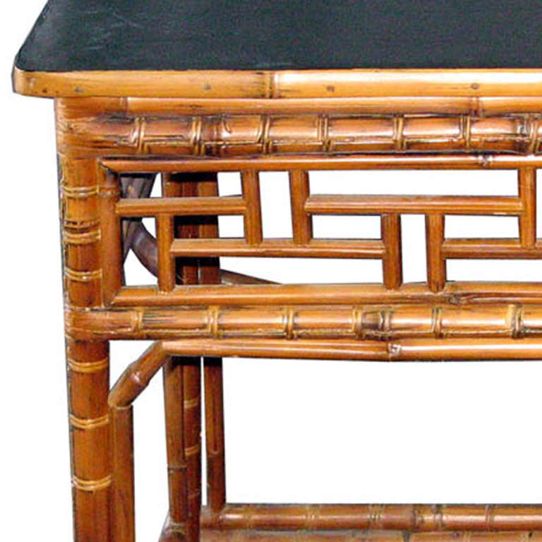 Bamboo table with black lacquer top surface. Use as an entry or end table.