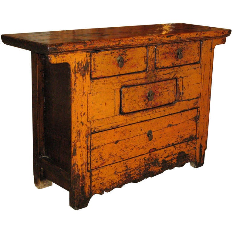 Antique four drawer chest with scalloped skirt and original orange lacquer finish. Shanxi, China, circa 1890. New hardware.