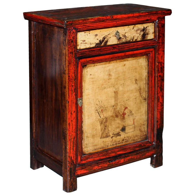 Vintage hand-painted red lacquer side chest with scholar's accoutrements on the door. Place next to a sofa or armchair with lamp and accessories on top.