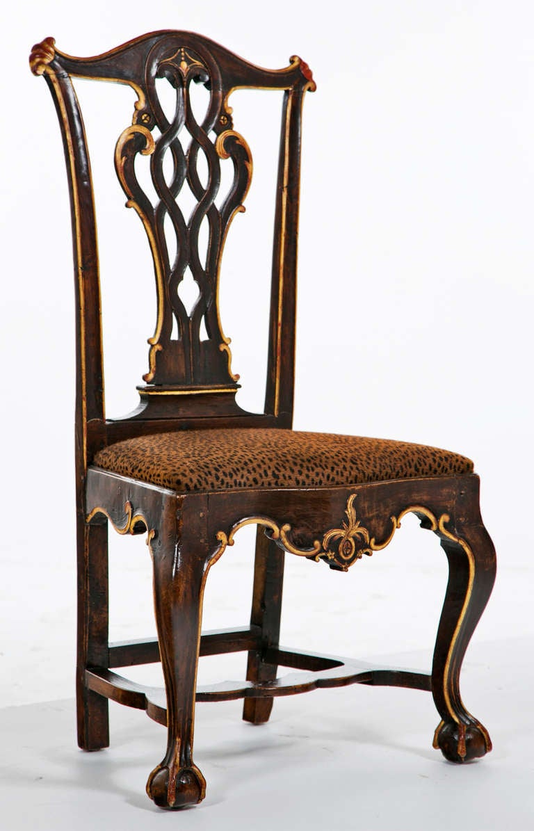A set of four 18th century Portuguese painted and gilded side chairs.  We love this model as it so closely resembles English designs of about the same period.  These chairs come from the collection of R. F. Schwarz.  A leading dealer of fine