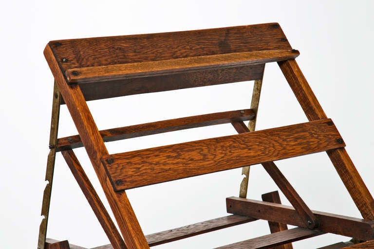 A wonderful Arts and Crafts period oak folding easel with adjustable brass hardware.  We think this was made in America late in the 19th century.   Art was often painted 
