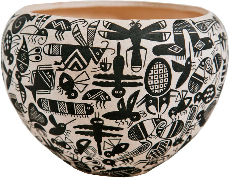 Native American pot by Acoma artist John F. Aragon.  The bowl shape pot decorated overall with Mimbres style tightly grouped varied insect designs in black and white.

From the collection of R. F. Schwarz, a seasoned dealer of fine porcelain and