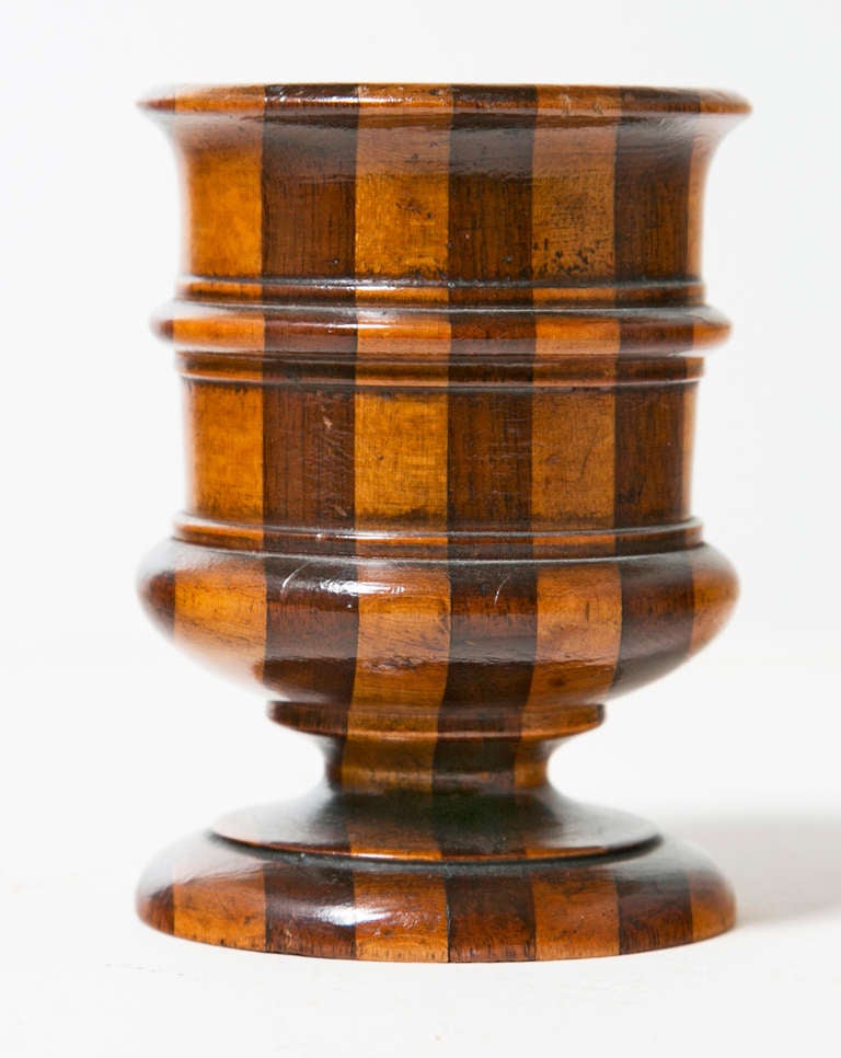 A good example of turned joined wood made popular by the English in the 19th century.  We love the color and condition of this piece dating to around 1870.