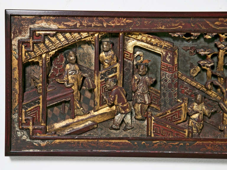 Wood panel carved with a pavilion scene with figures and flowering trees, surrounded by a painted border.

From the collection of R. F. Schwarz, a seasoned dealer of fine porcelain and objects, leading designer on the West Coast for decades and an