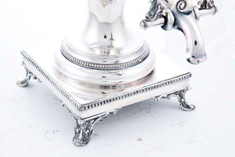 Classic Georgian style neoclassical silver plated hot water or tea urn made in England about 1860.  Wonderful decoration for your dining room.  The originals that this urn is designed after were made about 1770.