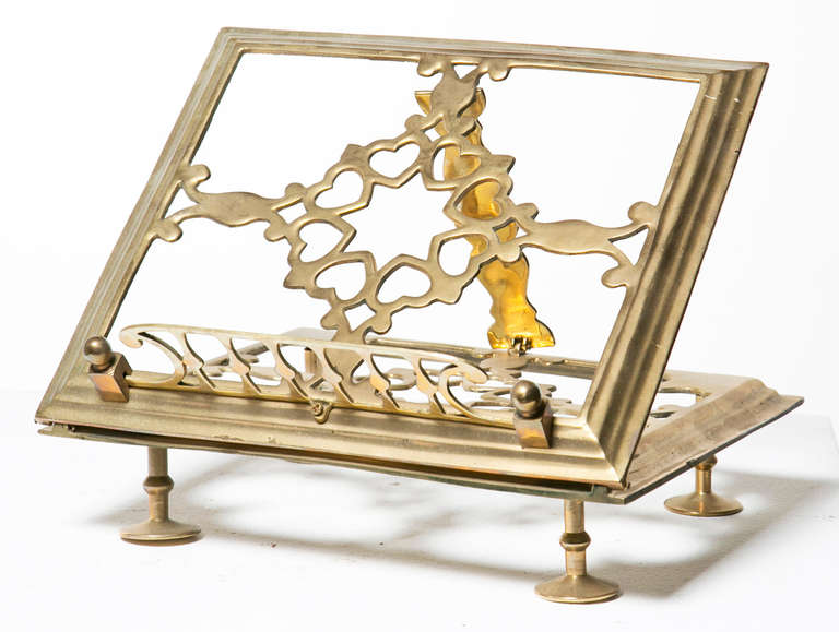 A rare and decorative adjustable book stand in brass made in the 17th century style probably a nice 19th century copy.