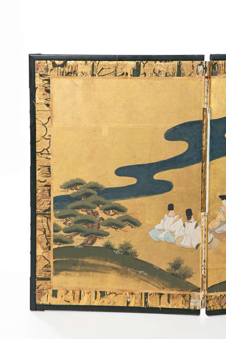 A very nice 140 year old painting of aristocrats  in a garden.  Hand painted with cherry blossoms and bonsai pine trees on a gold ground with a stream framing the gathering.  Screens like this one where used to create private areas in Japanese