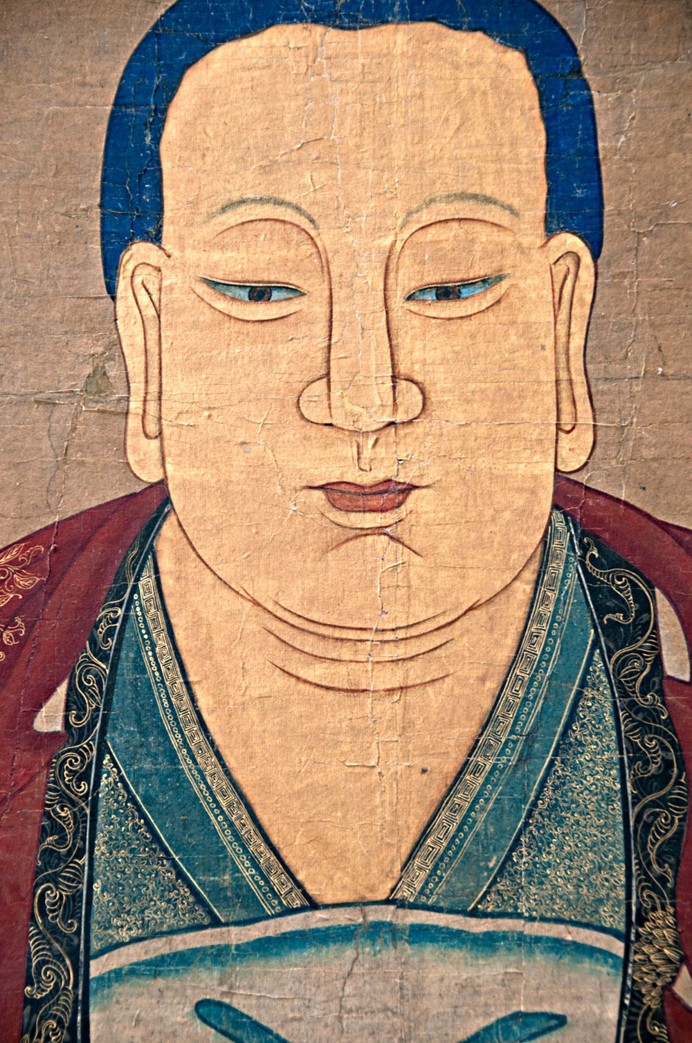 A rare and large Chinese painting of Buddha made in China about 1870.  Originally a scroll.  Professionally conserved and mounted on a later custom panel.  Religious scrolls of this size are rare because of their fragile nature and the destruction