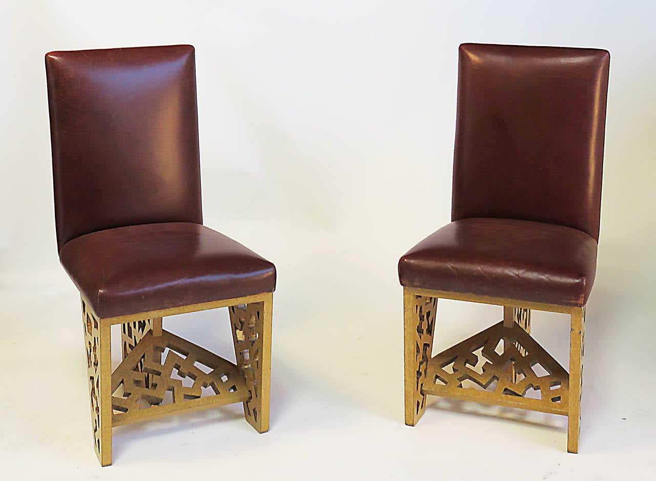 Exceptional sophisticated and visionary pair of chairs designed and executed by noted designer Robert Hutchinson active from the 1970s till his death in 2008. I see some influences of Frank Lloyd Wright and Keith Herring's iconic stick figures. It
