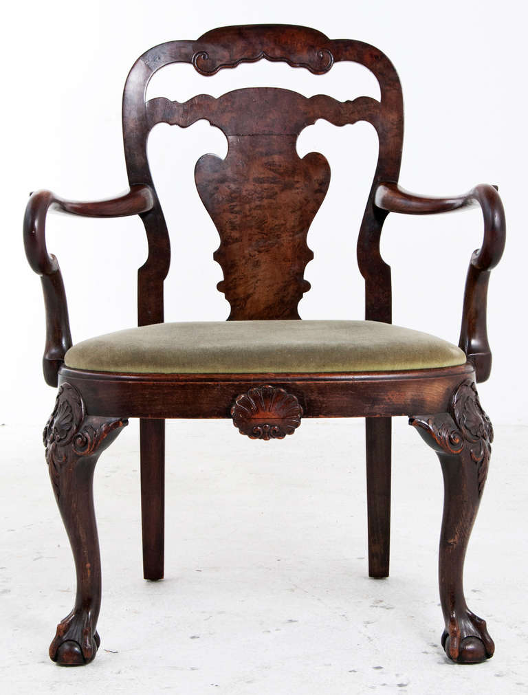 A very beautiful and large scaled chair based on designs first fashionable about 1720. The chair was made late in the 19th century and is possibly Irish. Chairs like these are very desirable and rare. An original from the period will bring a heroic