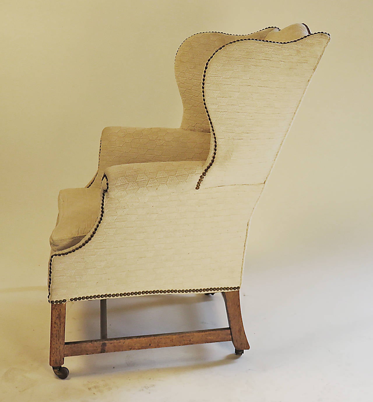 Classic III Period Faded Mahogany Wingback Chair, circa 1780 at