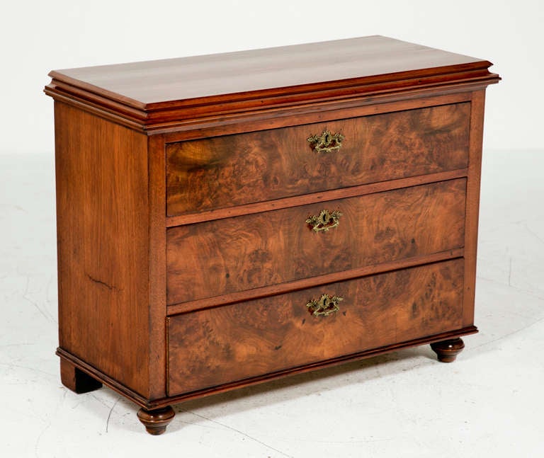 A nice 19th century Swedish or Danish chest of drawers in burled elm, circa 1880. This would be a great bedside chest. It would also work well in an entry hall. This piece has beautiful wood with storage in a rare small size. Recently professionally