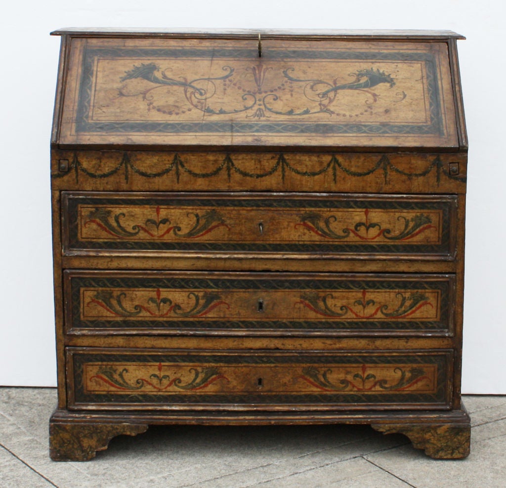 A very beautiful desk made in Northern Italy, circa 1770 with original or close to the period paint. Less than 2% of our inventory is shown here please contact us for specific searches. Take a look at our own site for more listings and information.