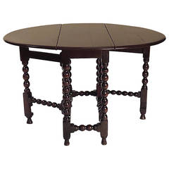 Charles II Provincial Round English Oak Drop-Leaf Table, circa 1680