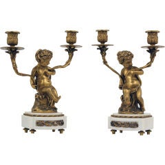 Pair of Marble 
Gilt Bronze Candelabras