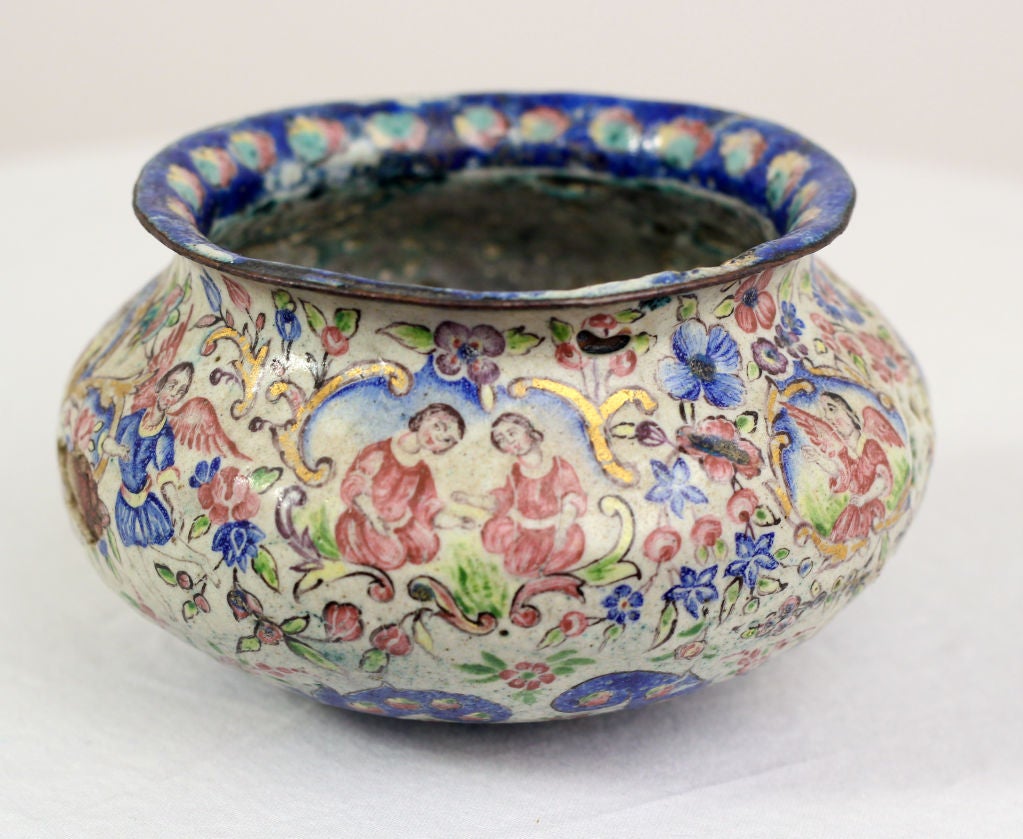 An interesting bowl decorated in enamels with angels and kneeling figures.  A wonderful attempt to imitate Chinese Export enamels made during the first part of the 19th century.  This piece is interesting because it is a Middle Eastern idea of what