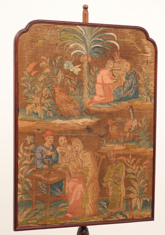 A classic fire screen with period French tapestry panel in frame.