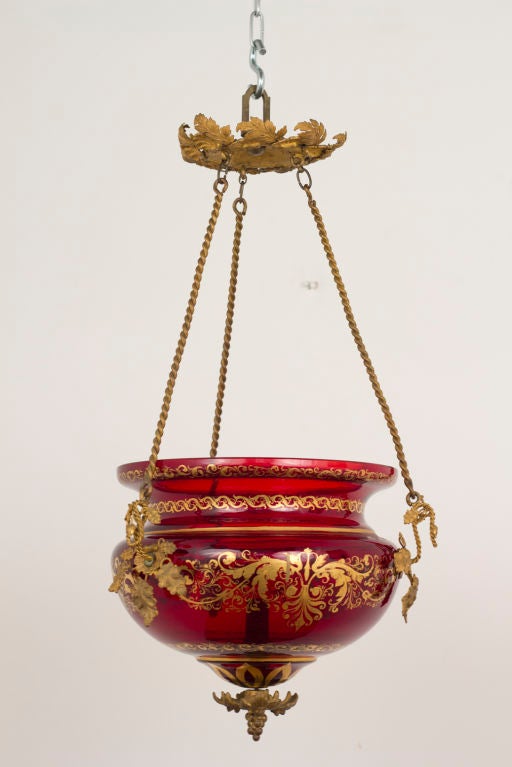A very beautiful and scarce Russian red glass lantern with gilt decoration and original gilt metal fittings.  From a good West coast collection.  Exceptional condition.